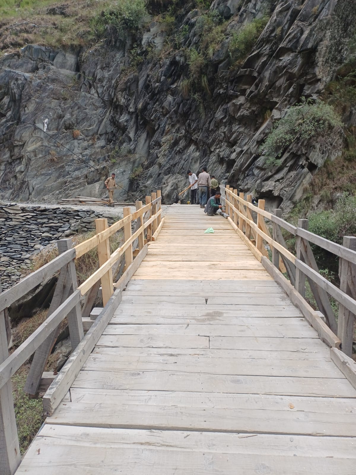 Damaged wooden bridge over Ravi at Siyur restored